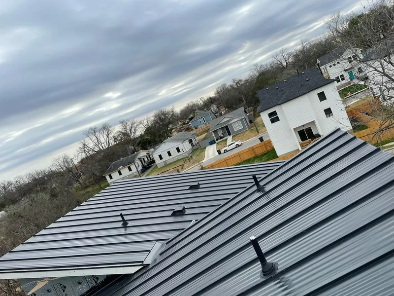Standing seam metal roof panels with vents for Skylight Repair in Irondale